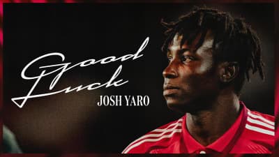 Josh Yaro in red jersey wishing good luck